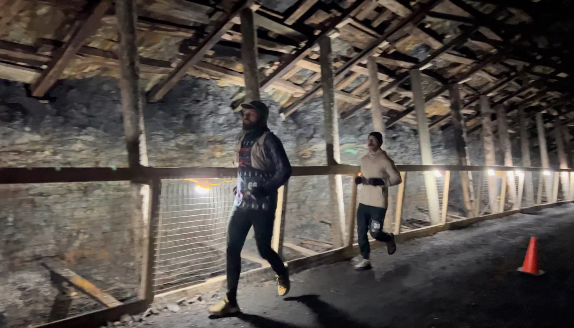 Runners make their way through the course in the Bellevue Underground Mine