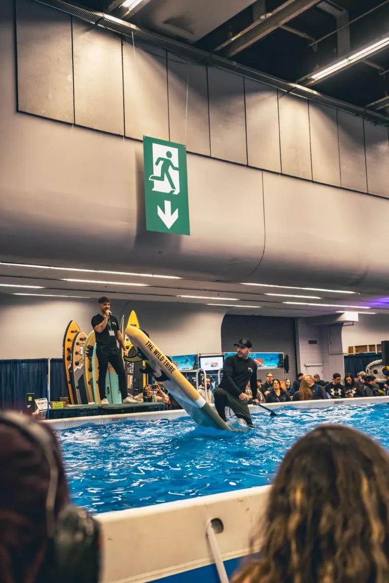 Yann Fortin performs freestyle SUP tricks at The Wild Tribe trade show