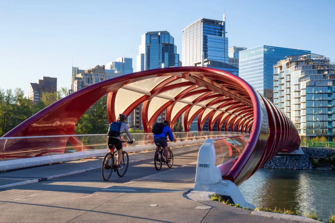 Cycling over the Peace Bridge in Calgary, AB