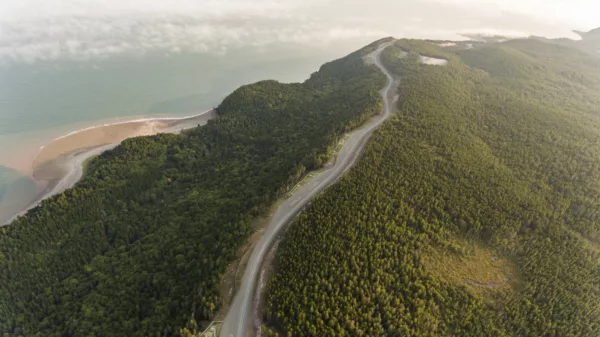 Aerial view of Seeley beach and newly constructed portion of Fundy Parkway looking West